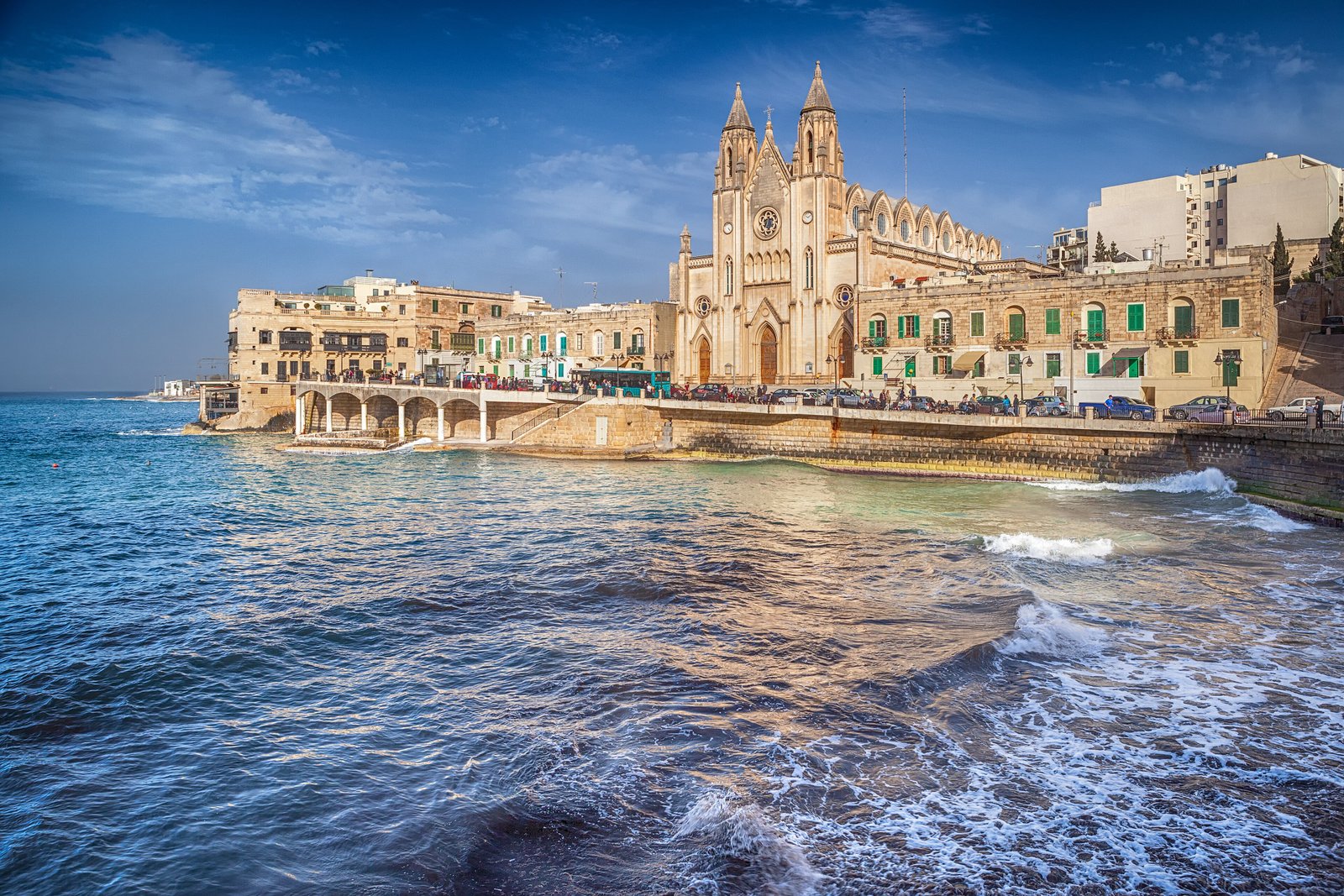 Church facade by Balluta Bay in Malta