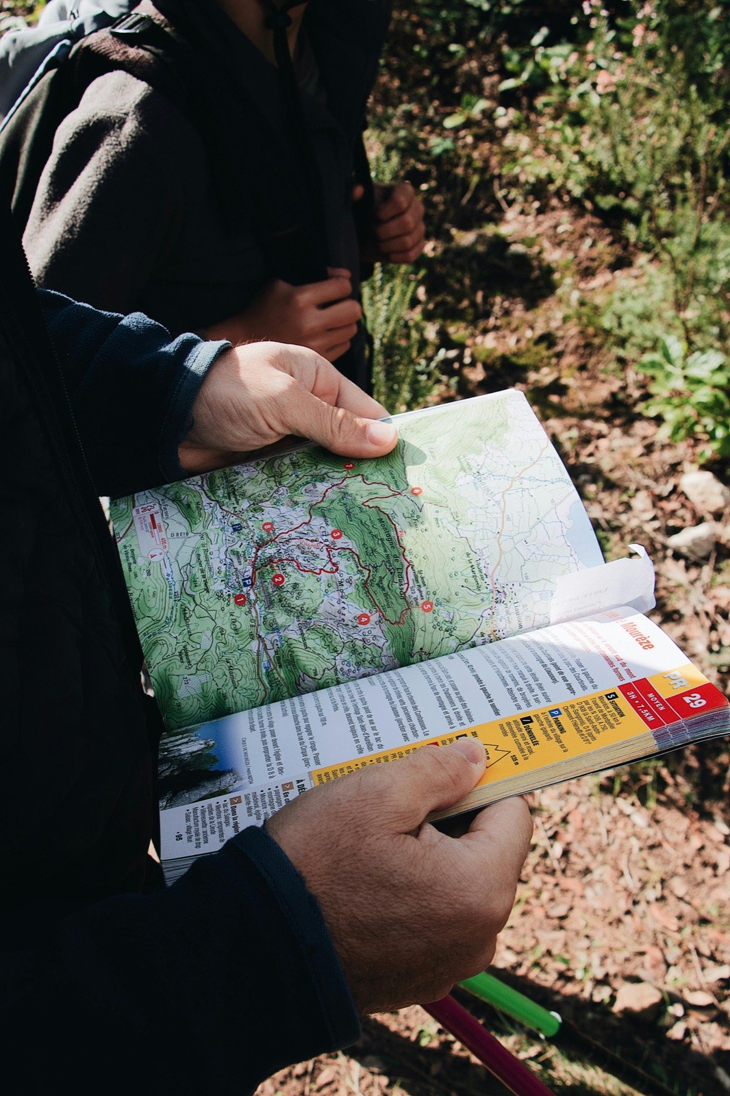 Traveller holding a route map outdoors